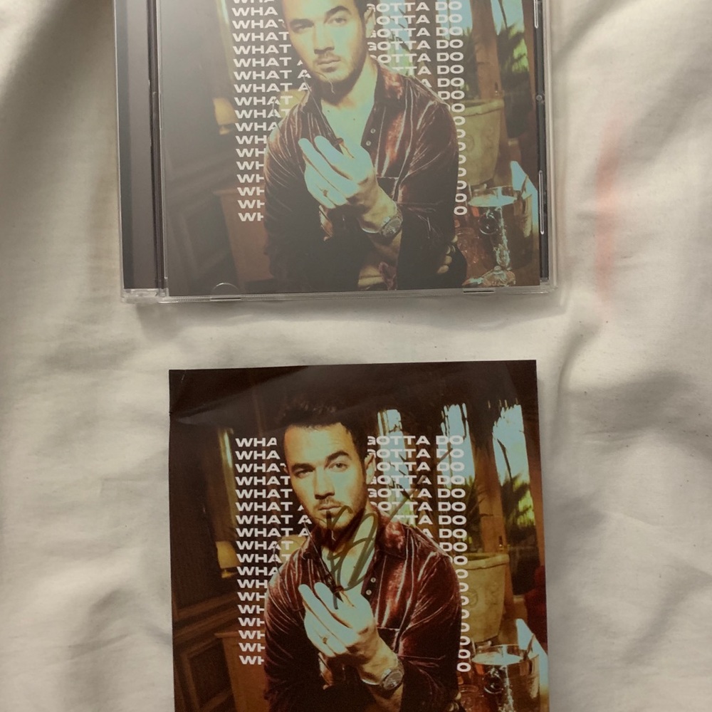 Kevin Jonas autographed What a Man Gotta Do CD